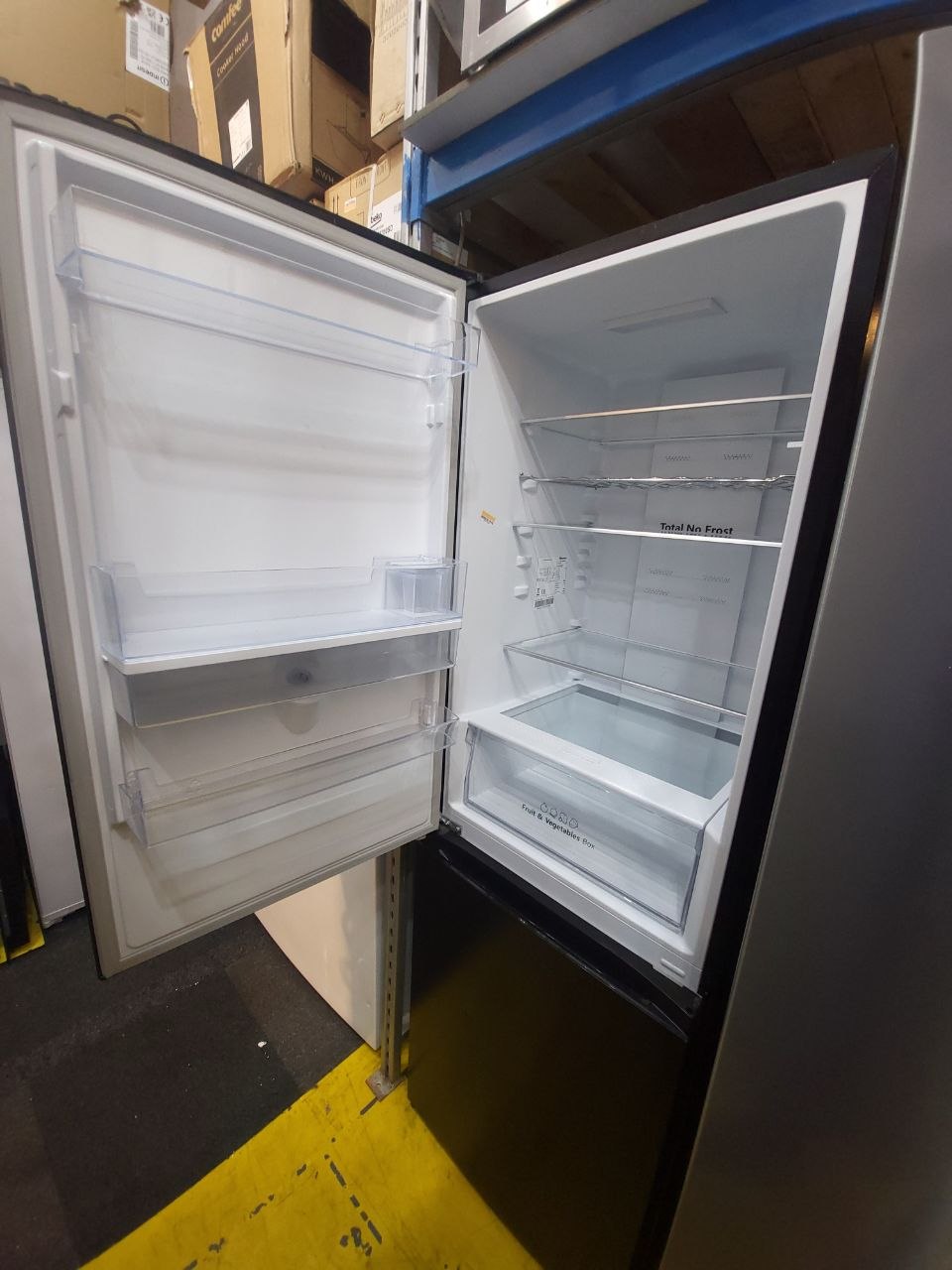Indesit Fridge/Freezer £239 H: 185 cm W: 58 cm Fridge: 100 cm Freezer: 80 cm Water dispenser